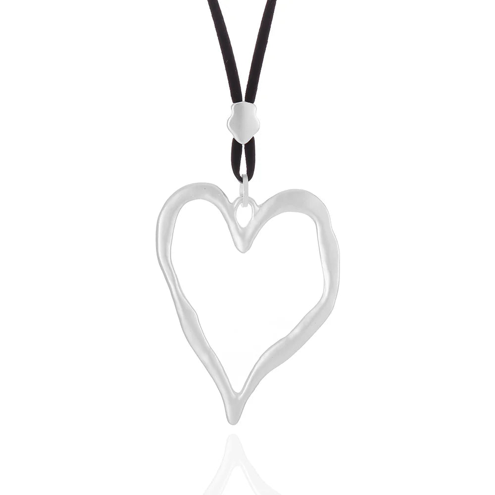 Open Heart Pendant Necklace - Silver with Black Cord, model view
