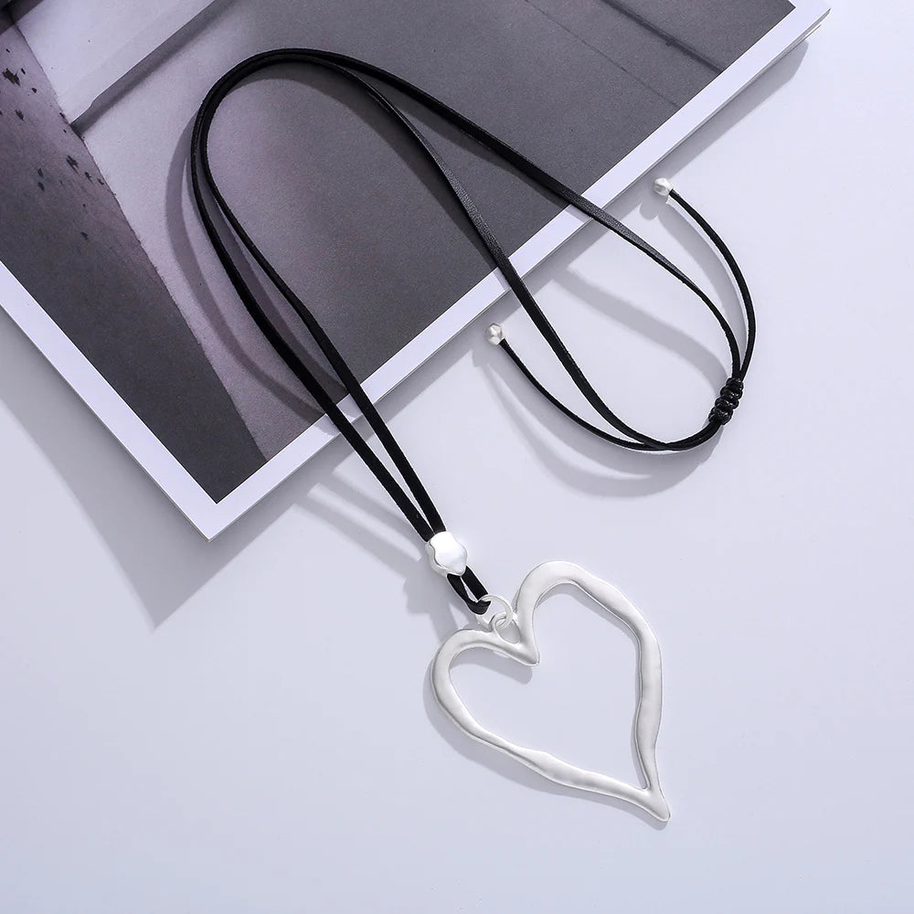 Open Heart Pendant Necklace - Silver with Black Cord, product shot